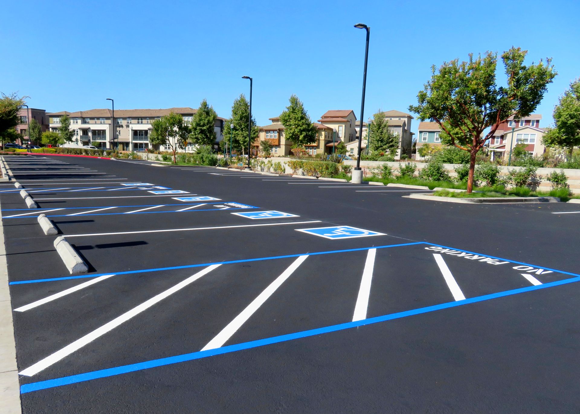 freshly-resurfaced-and-repainted-handicap-parking-space-in-a-parking